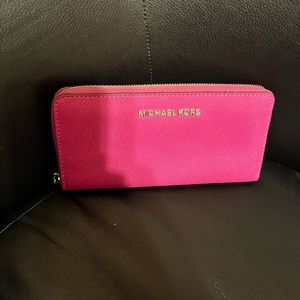Pink large wallet. Lined in black
